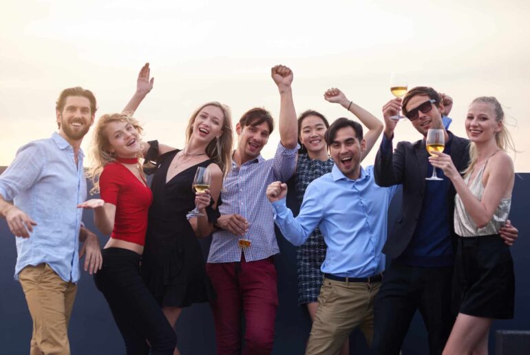 Cheerful people enjoying their corporate party