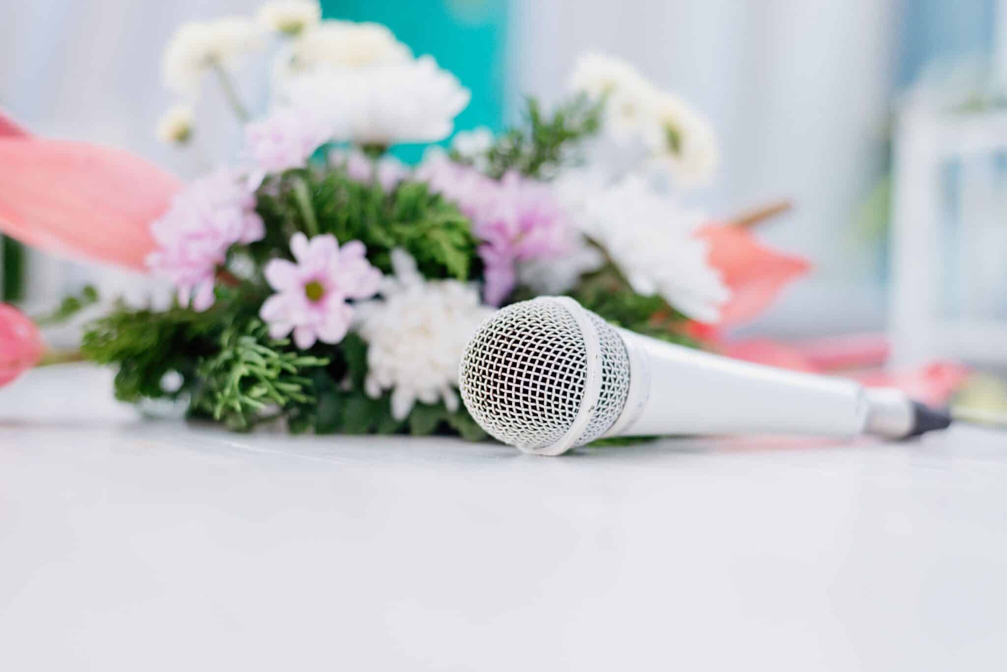 Flowers and a microphone for wedding